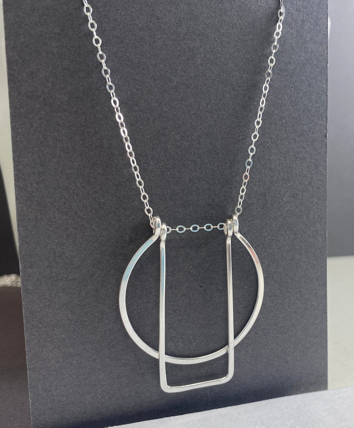 Long silver geometric necklace