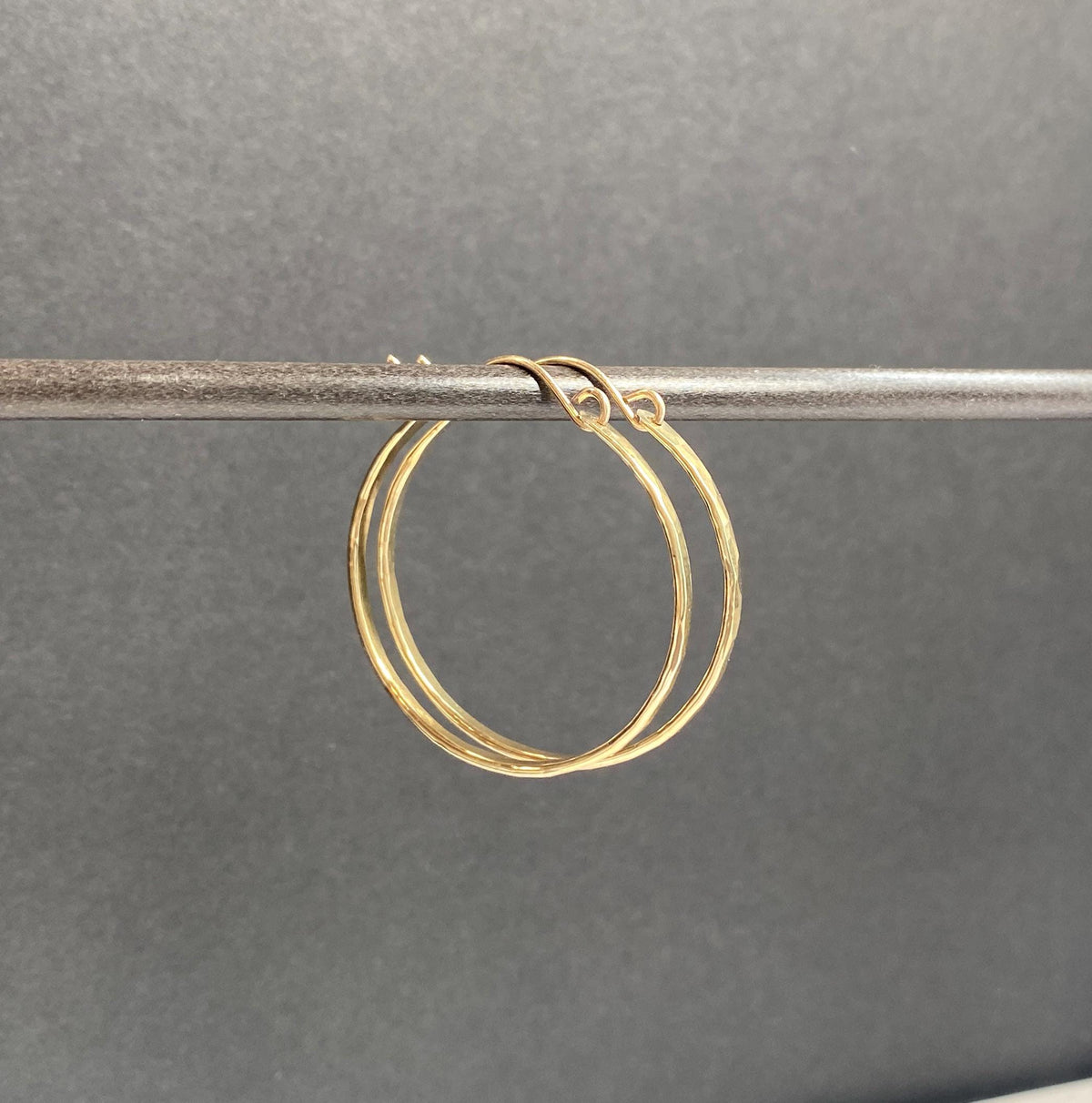 Flat front hammered medium gold hoop earrings