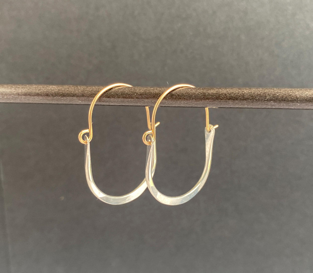 Silver and gold small oval hoop earrings