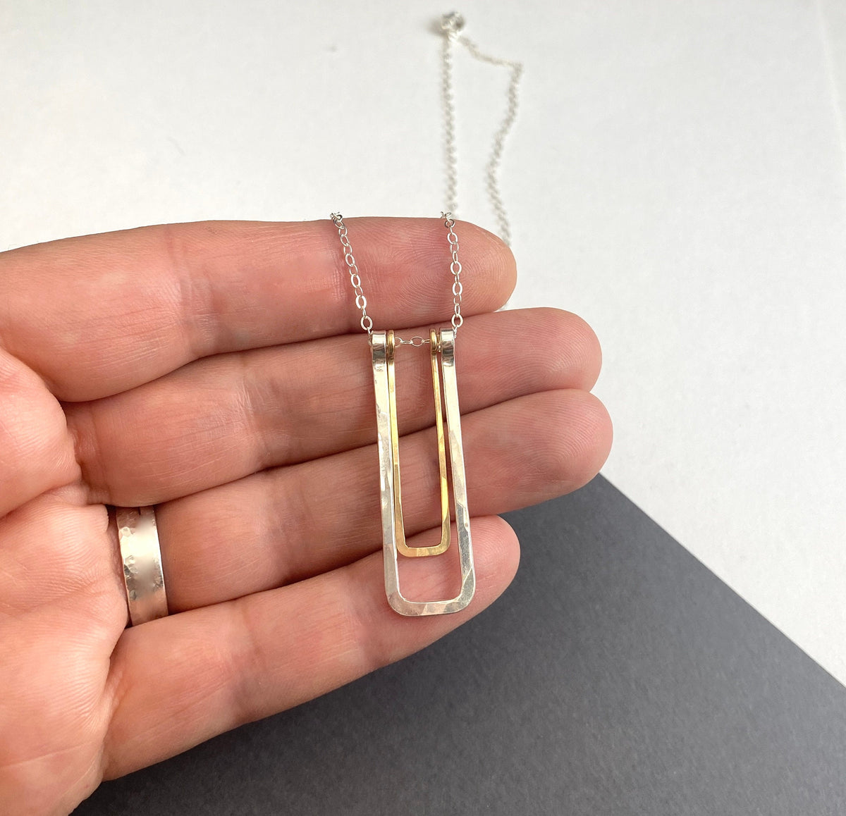 Long silver and gold rectangle pendant necklace