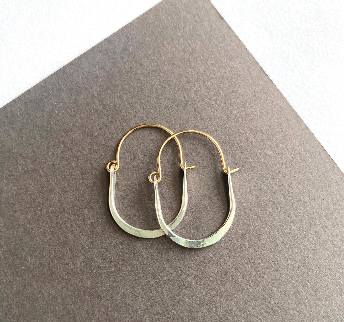 Silver and gold small oval hoop earrings