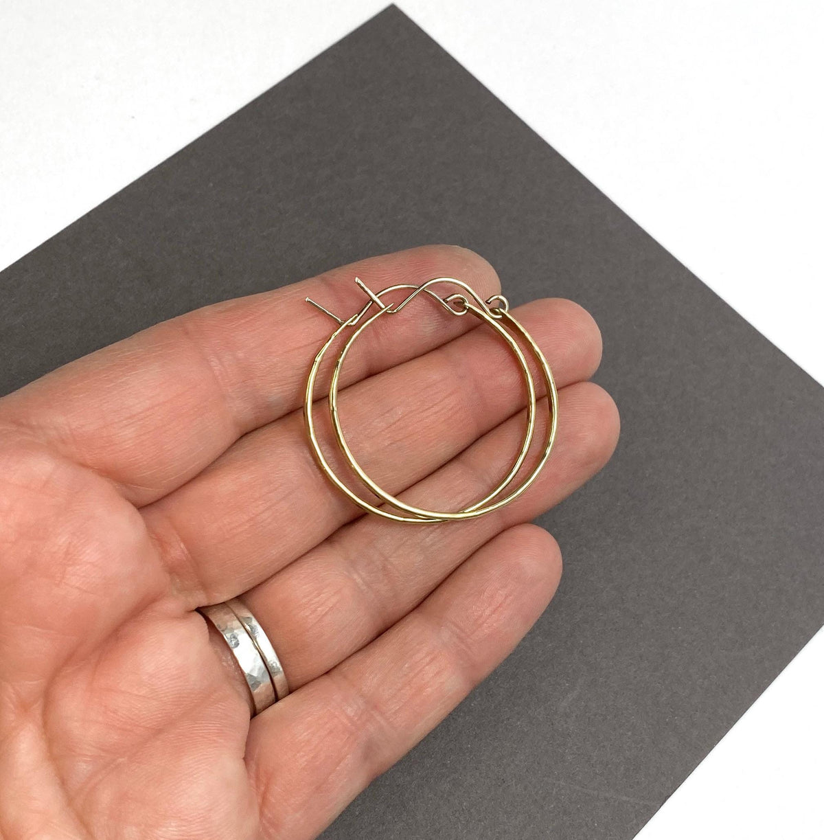 Flat front hammered medium gold hoop earrings