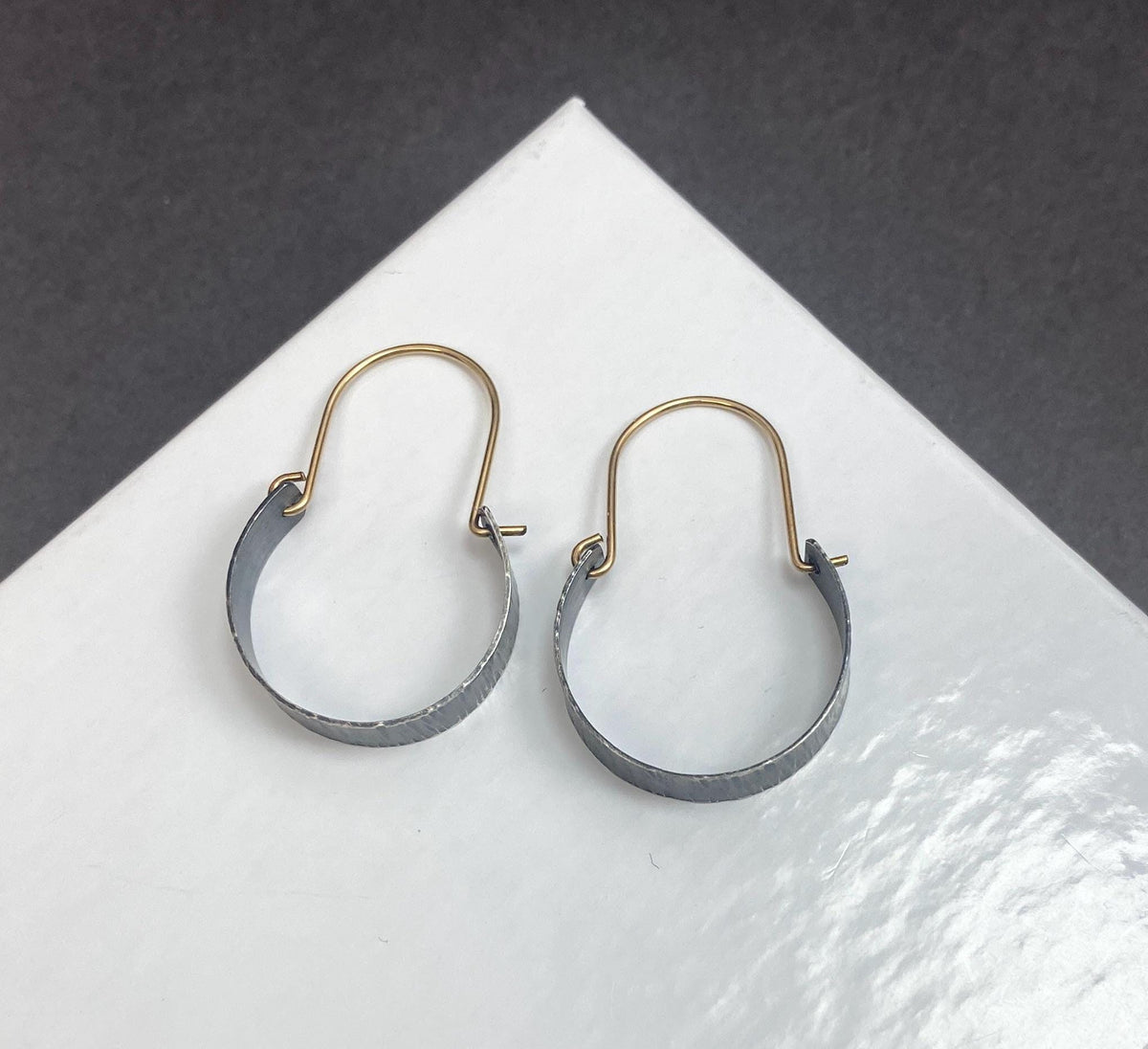 Small oxidized silver and gold two tone hoops