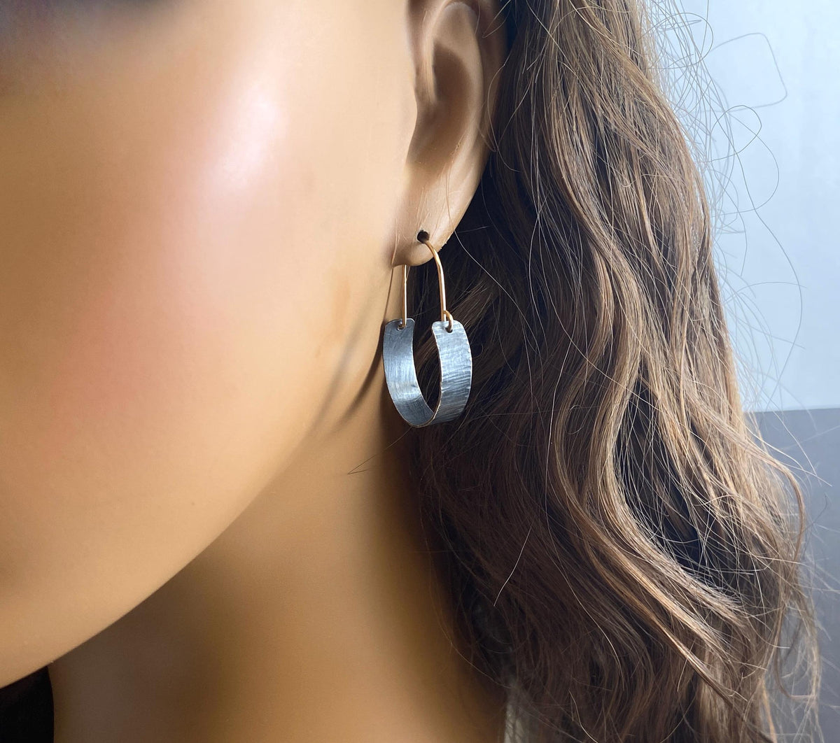 Small oxidized silver and gold two tone hoops