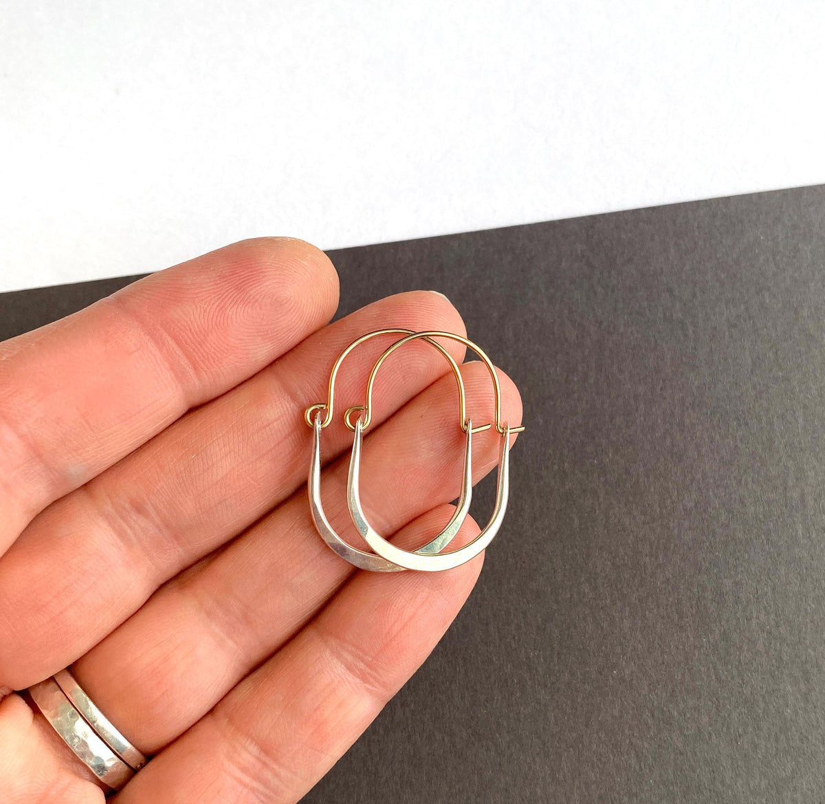 Silver and gold small oval hoop earrings