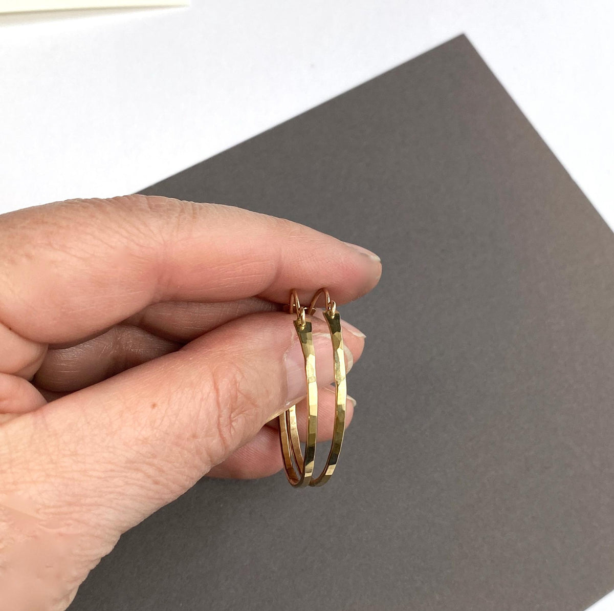 Flat front hammered medium gold hoop earrings