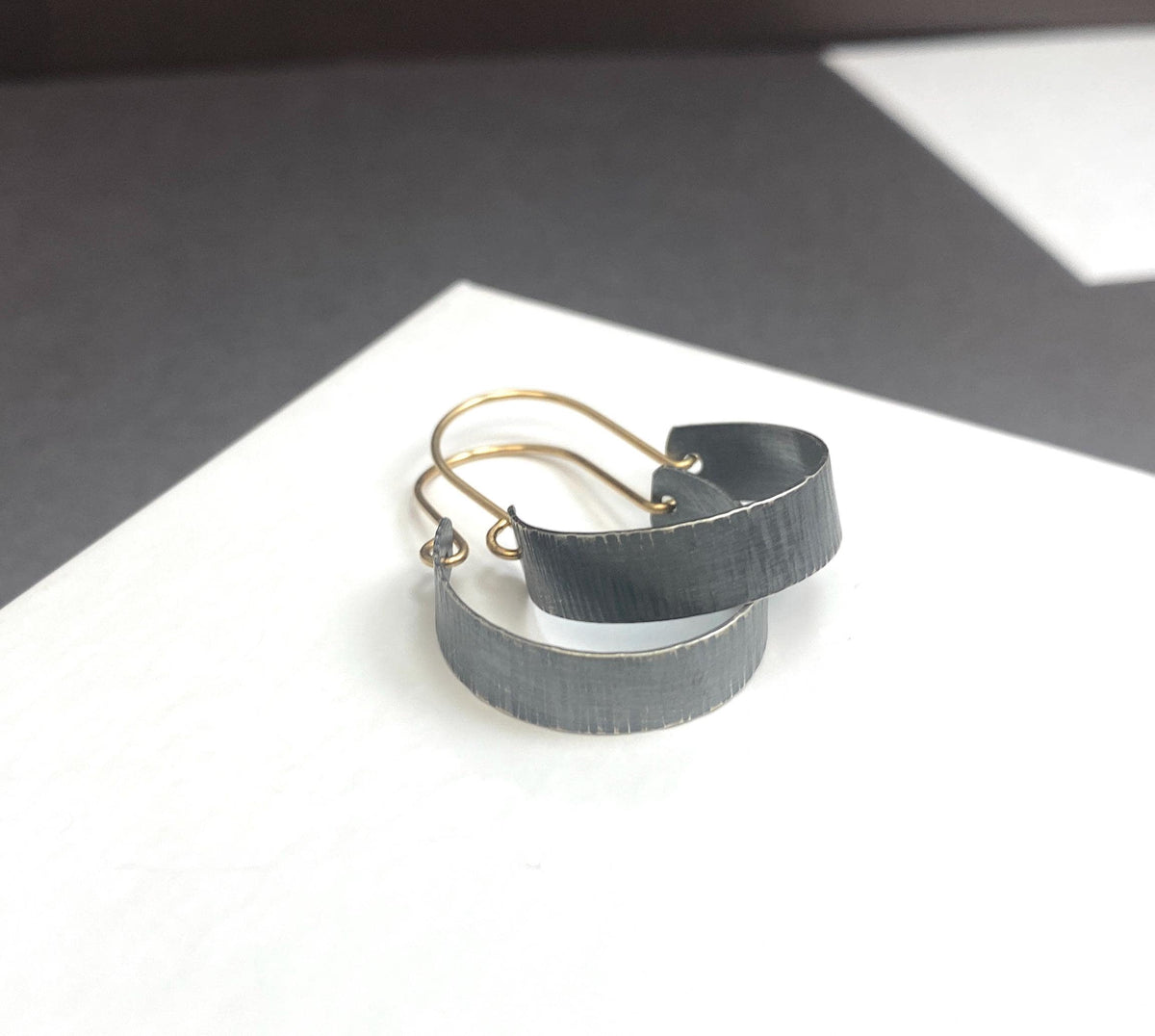 Small oxidized silver and gold two tone hoops