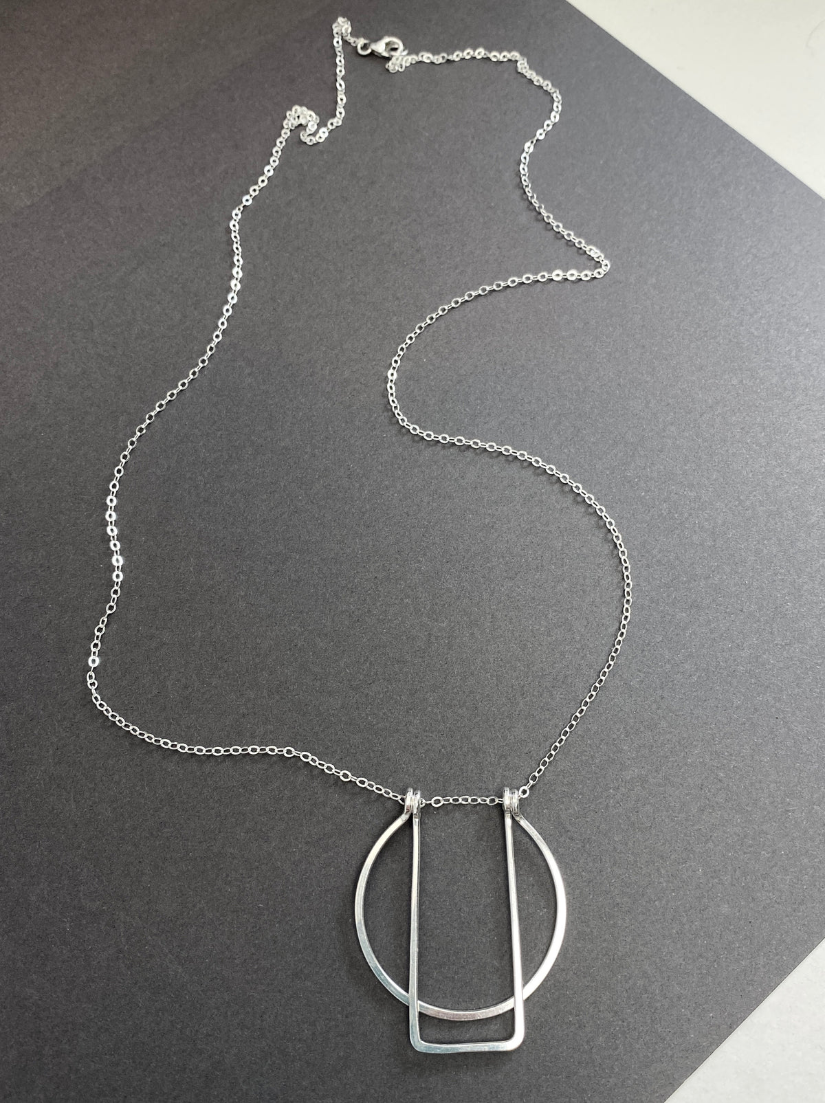 Long silver geometric necklace