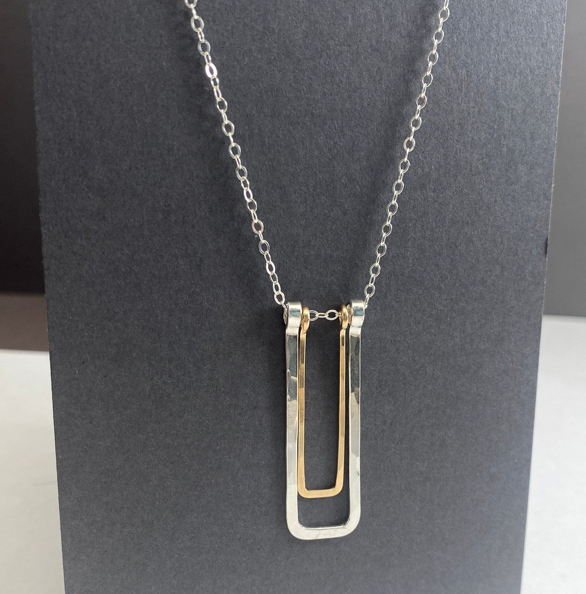 Long silver and gold rectangle pendant necklace