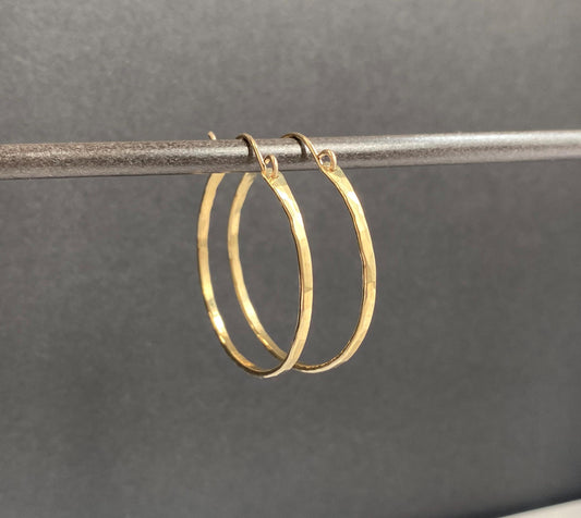 Flat front hammered medium gold hoop earrings