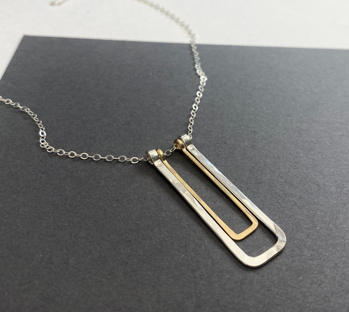 Long silver and gold rectangle pendant necklace